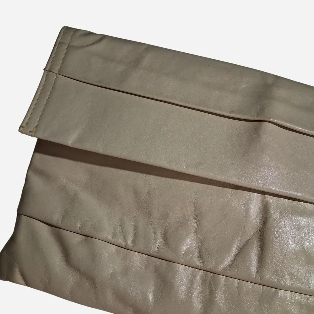 Womens 90s leather clutch bag with a boho vibe tan/cream